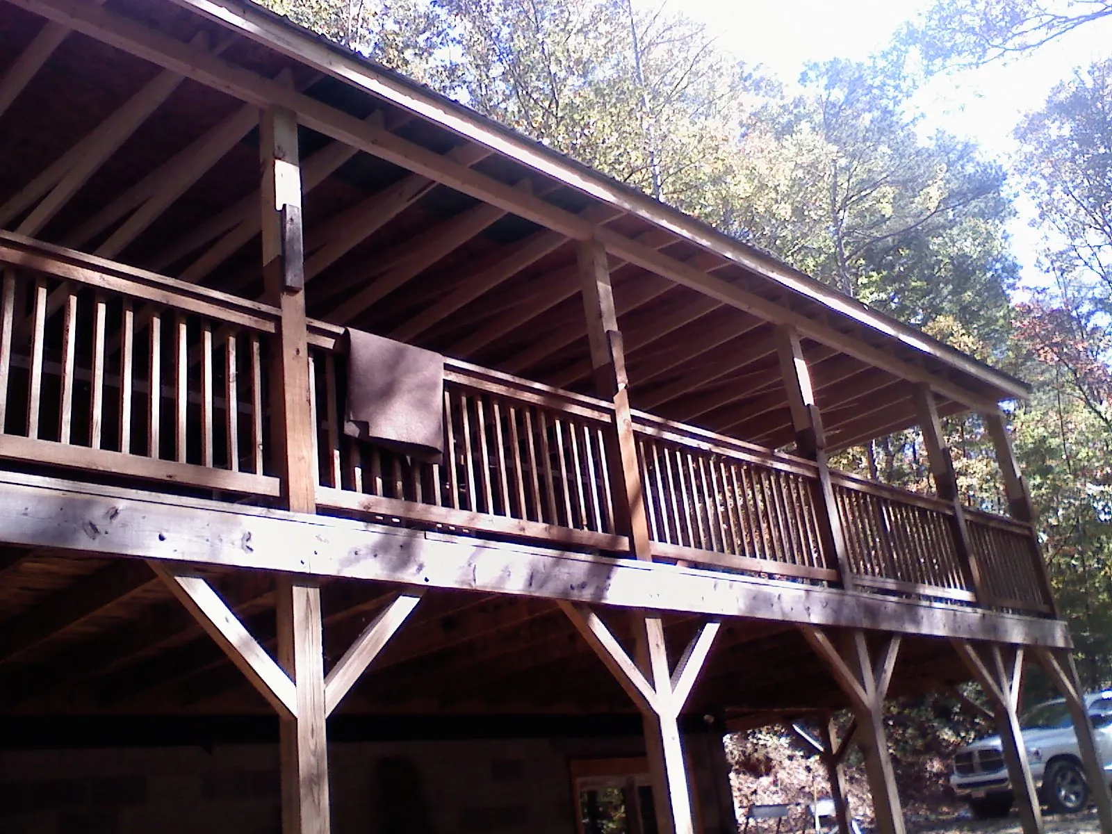 Timber framing under a new elevated porch and deck — Roof Leak Repair in Mesa by Roofing Brothers